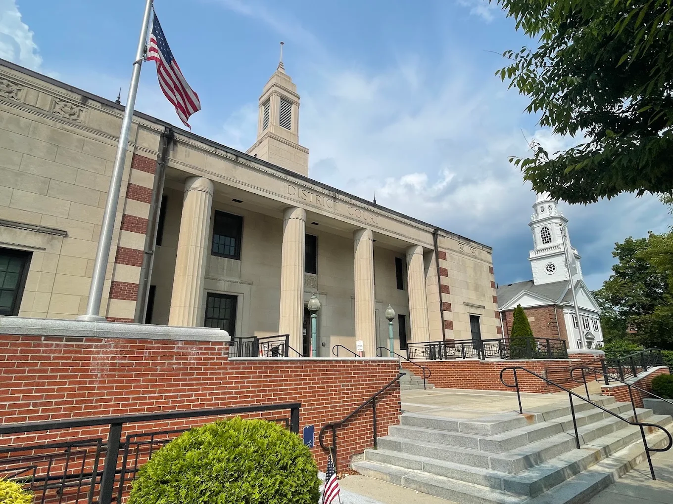 Town hall with columns and church steeple